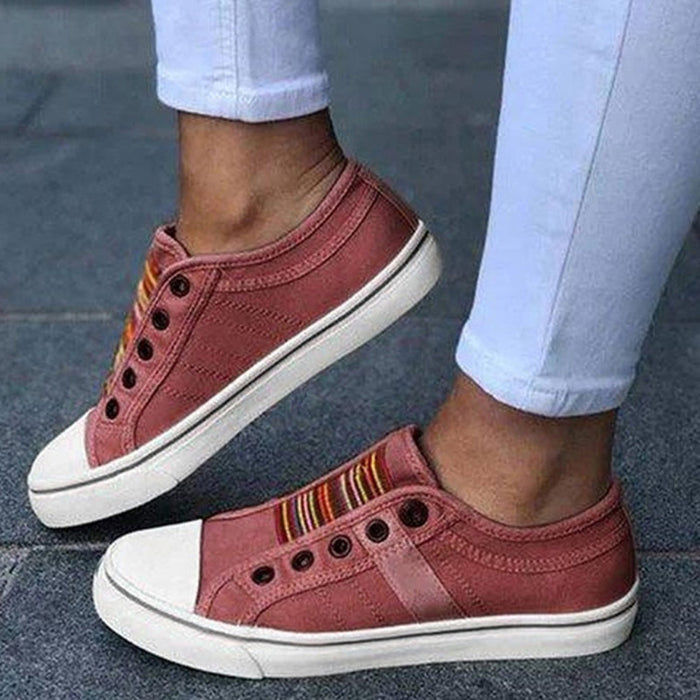 Dam Slip-On Sneakers med Vit Tå och Stripdetaljer