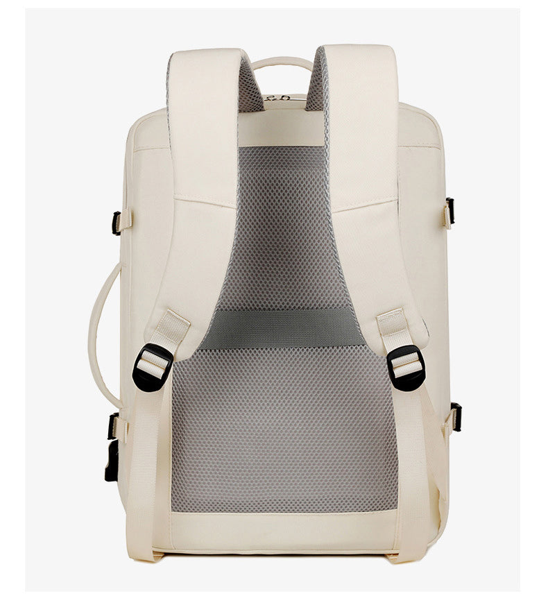 Grå ryggsäck med laptopfack och många fickor